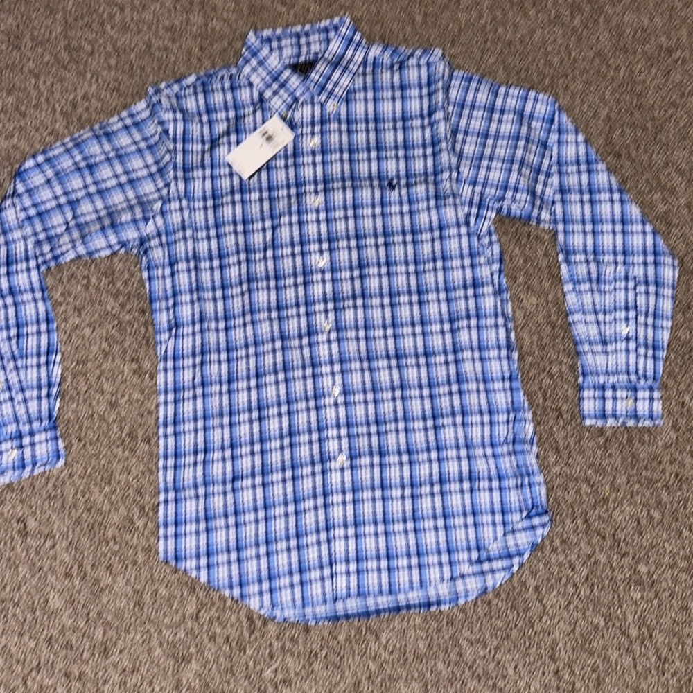 Blue and white plaid polo shirt.